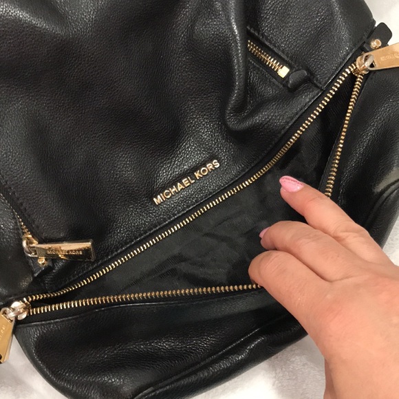 Michael Kors backpac with multiple pockets. Outside has some stains as pictured - Picture 7 of 15